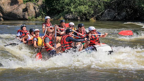People tubing down a river