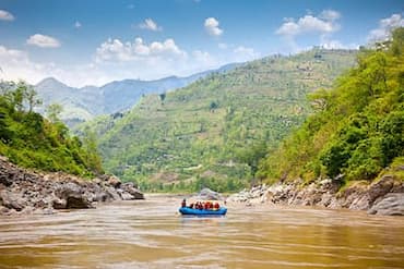 Rafters navigating rapids